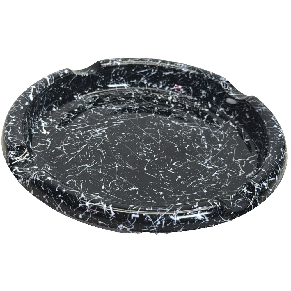 vintage mid-century glass ashtray featuring a white spaghetti splatter design